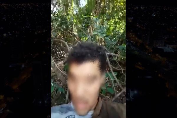Imagem referente a notícia: Três Barras do PR: Homem preso grava vídeo escondido em mata, caso fosse encontrado sem vida