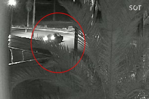 Imagem referente a notícia: Câmera de segurança registra fuga dos assaltantes que roubaram carro no Loteamento Barcelona