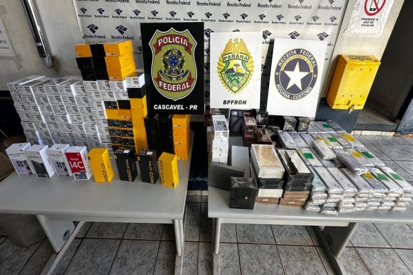 Imagem referente a notícia: Apreensão Milionária! Polícia estoura esquema de contrabando em Ônibus na BR-277