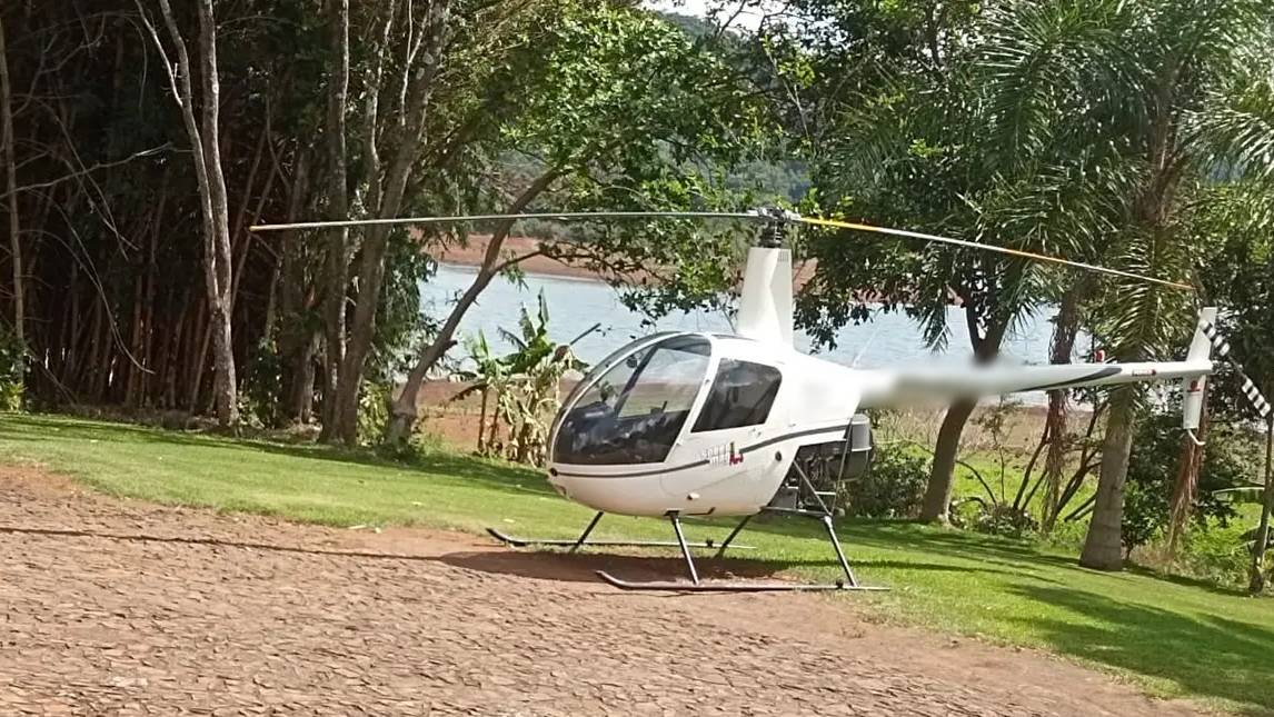 Helicóptero cai em alagado de Candói, no Paraná: Casal de empresários sobrevive ileso